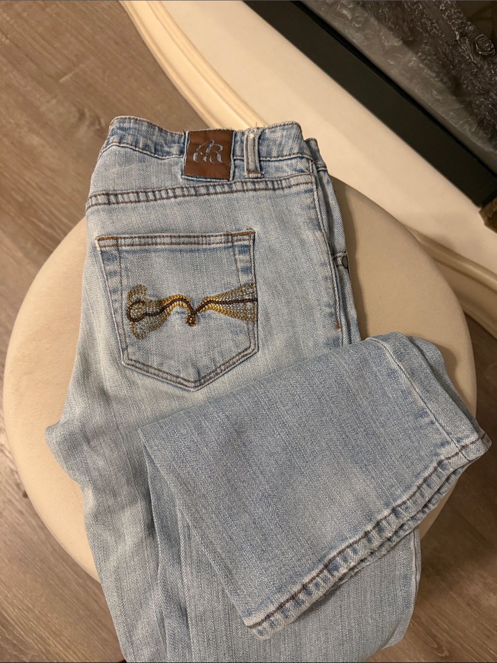 Vintage American Rag Light Blue Bootcut Jeans with Embroidered Back Pocket